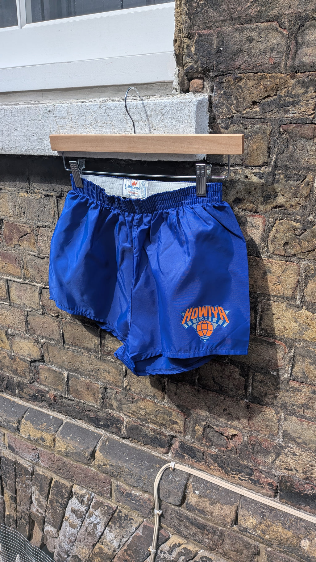 Deadstock 80s nylon running shorts with howiya logo