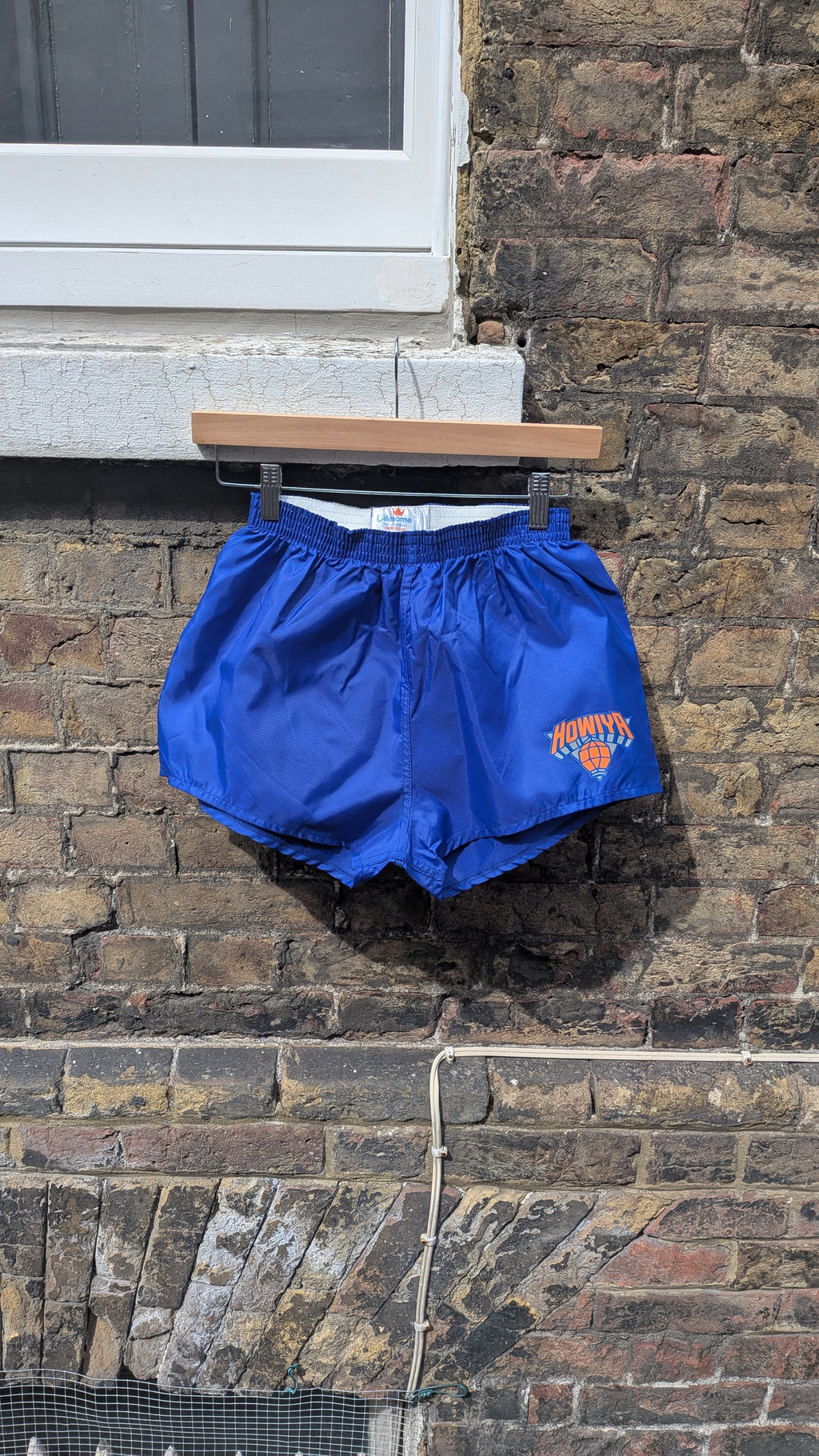 Deadstock 80s nylon running shorts with howiya logo