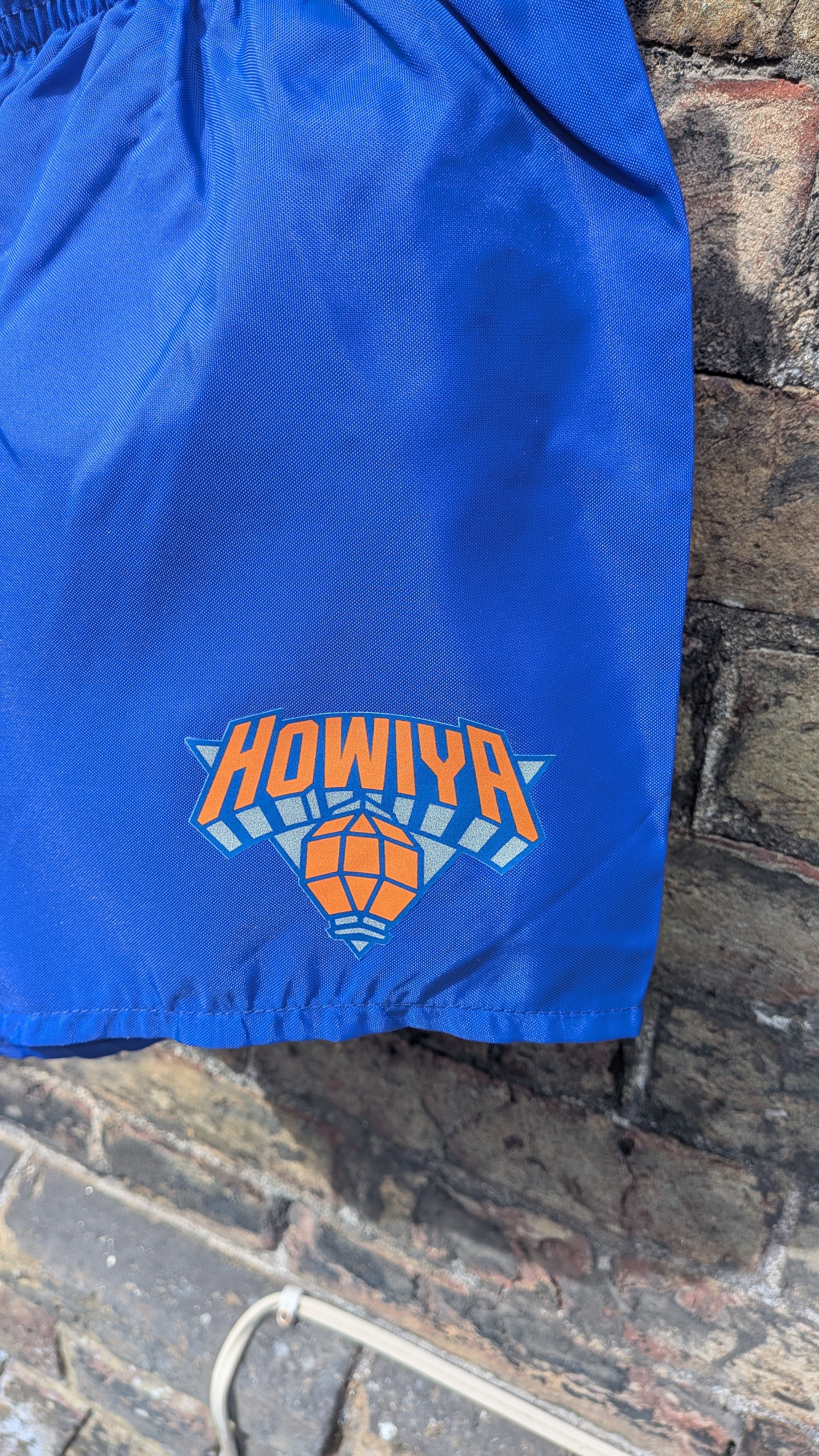 Deadstock 80s nylon running shorts with howiya logo